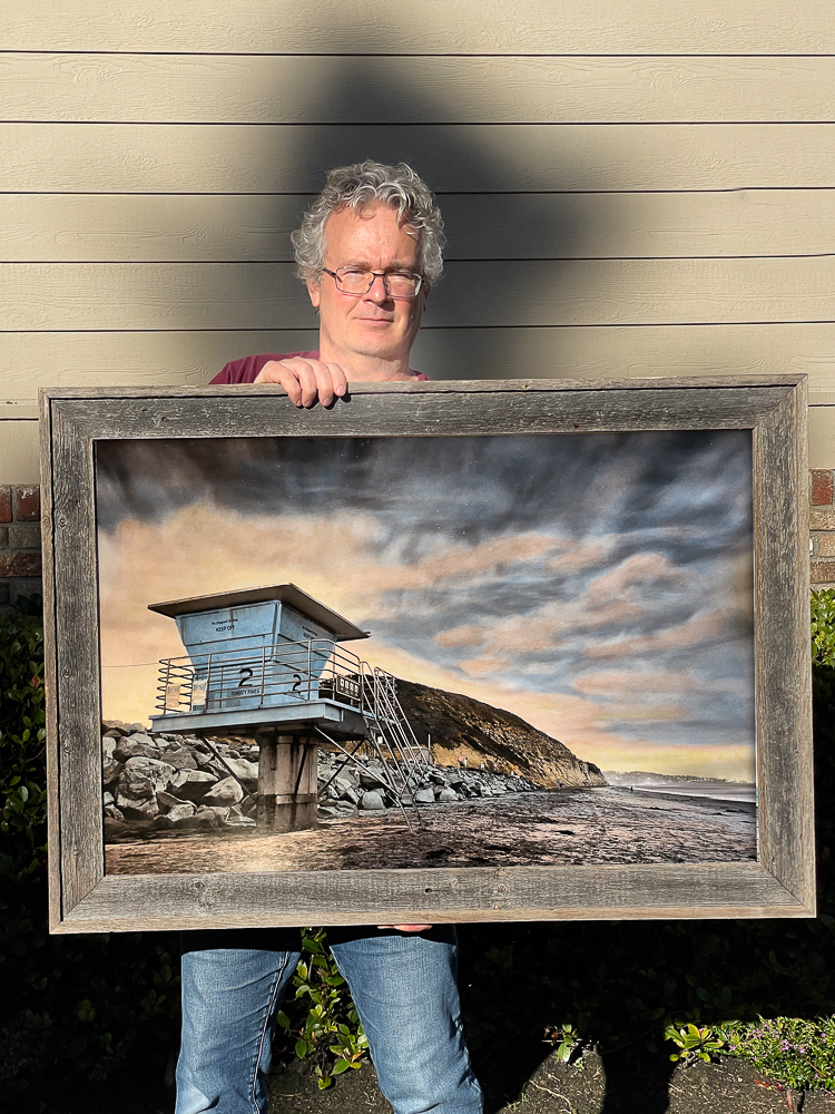 roy holding a hand colored 36x24 inch Moon Tower - tower 2 at Torrey Pines