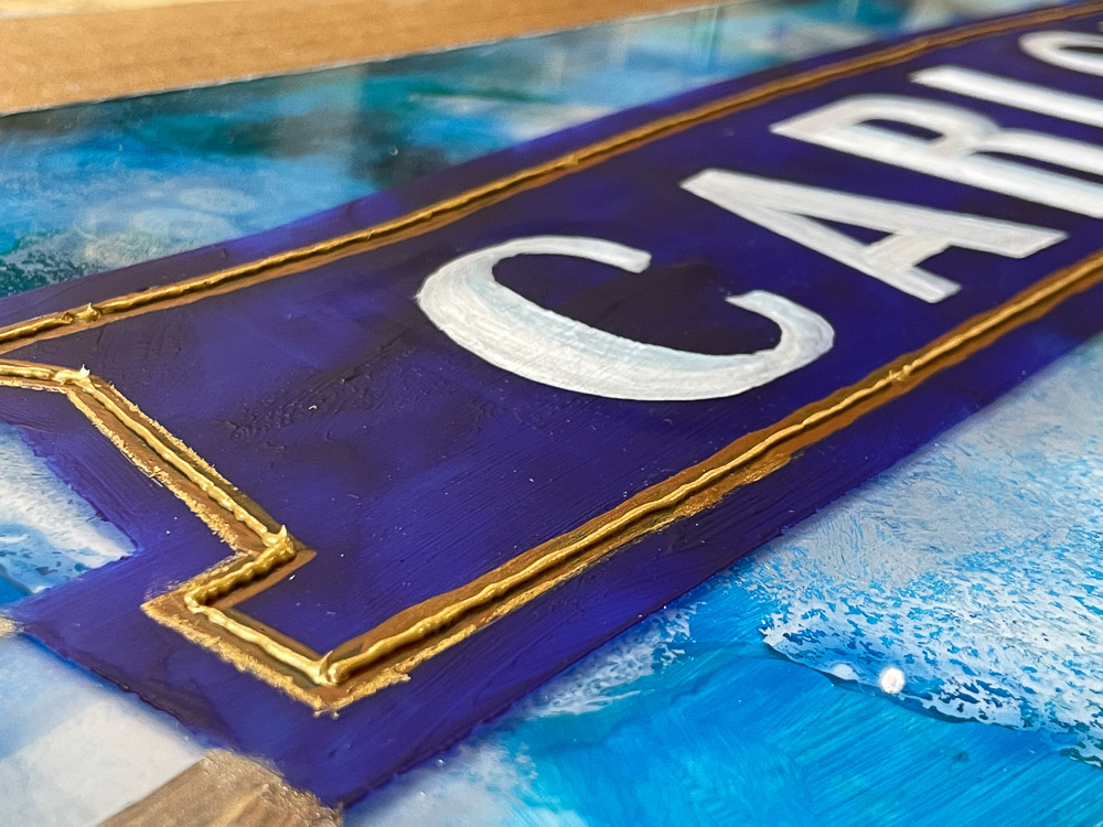 carlsbad sign painting close up of gold lining